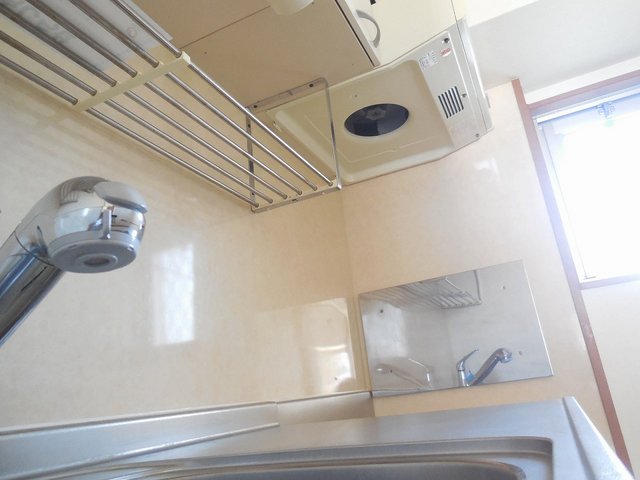 Kitchen. There is a window in the kitchen