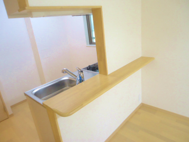 Other room space. Counter kitchen