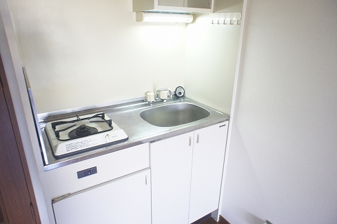 Living and room. It is with a gas stove.