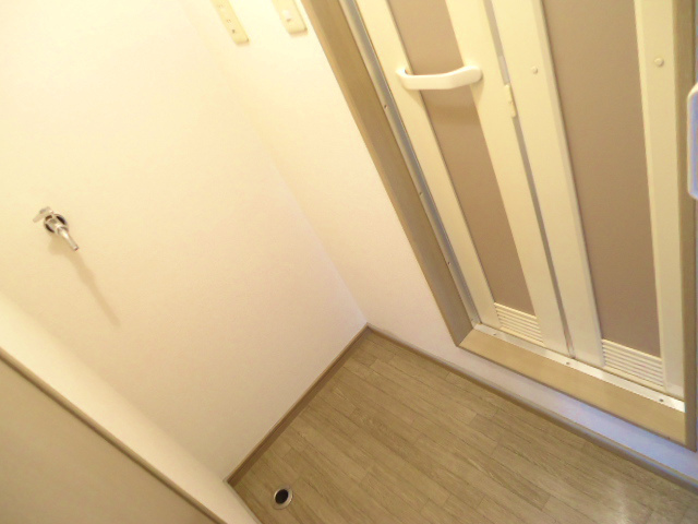 Other room space. It is with in-room washing machine storage