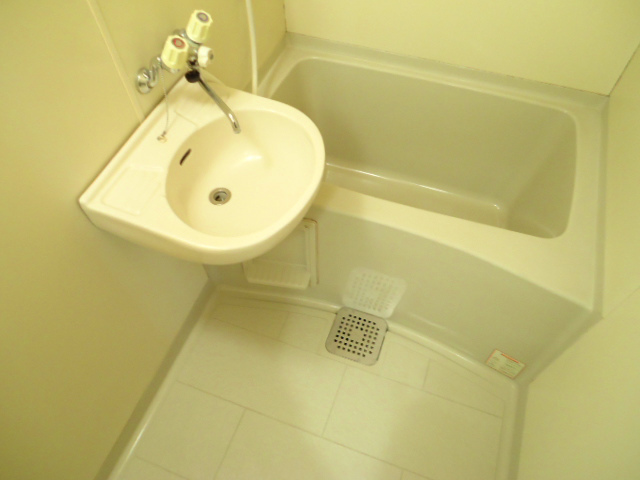 Bath. It is with a basin