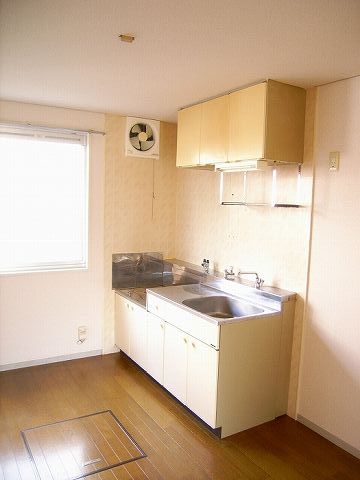 Living and room. It is bright because there is a window.