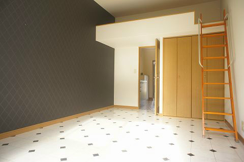 Living and room. It is a beautiful room with a loft.