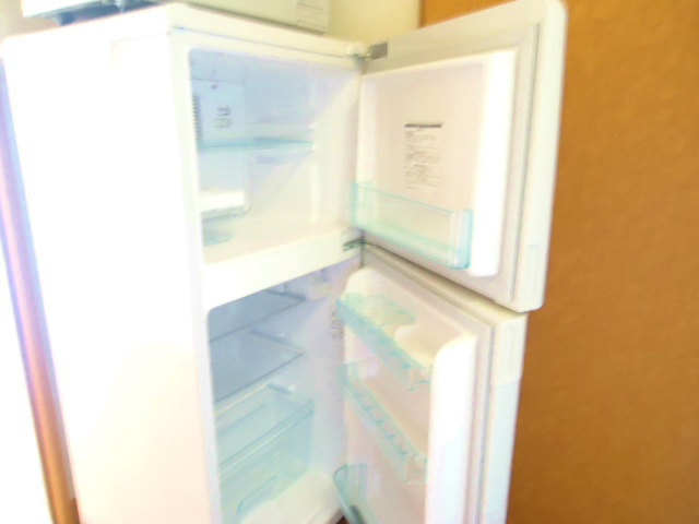 Other room space. It is with a refrigerator