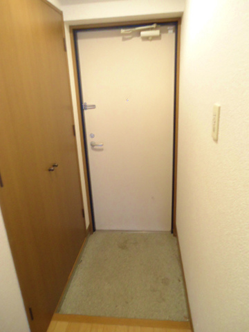 Entrance. Shoes is with a box