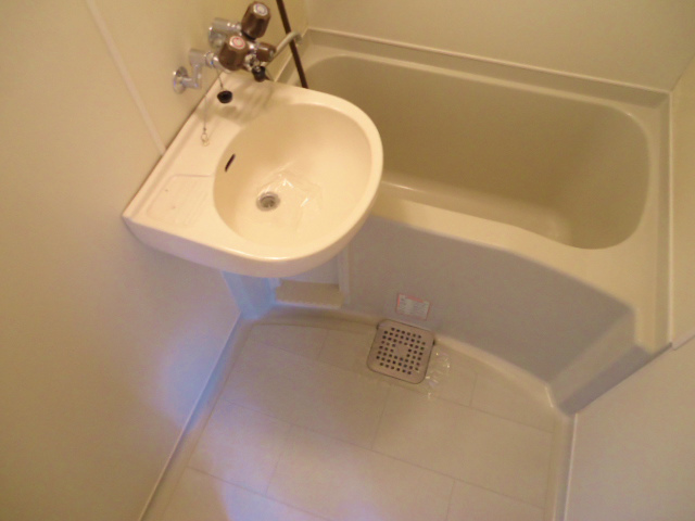 Bath. It is with a basin