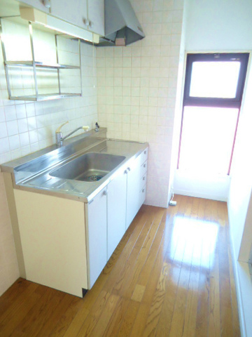 Other room space. There is a window is bright