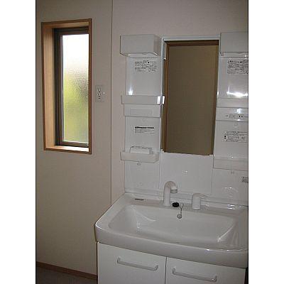 Wash basin, toilet. Basin dressing room with a small window!