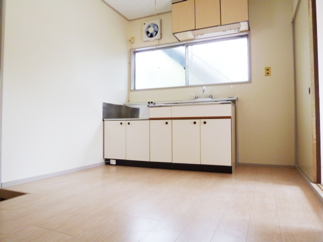 Living and room. The room is also bright in the bright colors of flooring