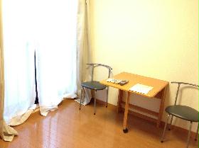 Living and room. The first floor is flooring, The second floor is a carpet