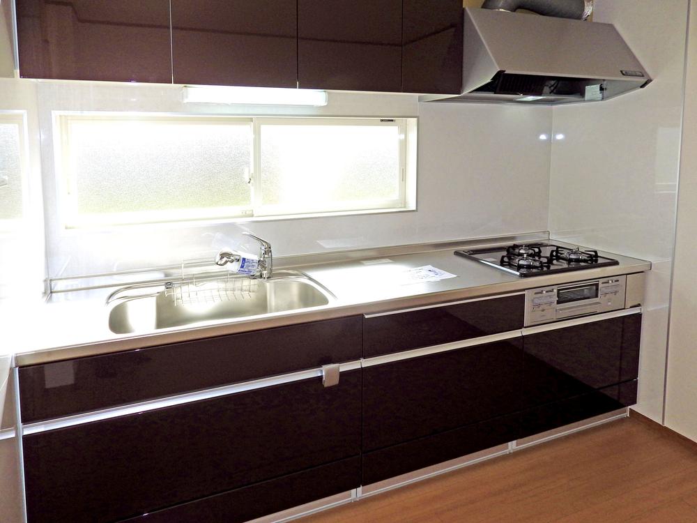 Kitchen. 3-burner stove high firepower comes with a large sink.