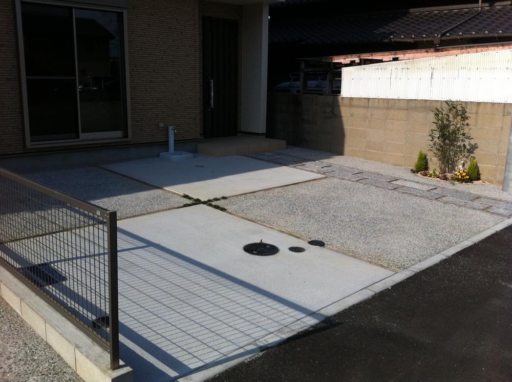 Local photos, including front road. 2 car secure in the parking lot is flat.