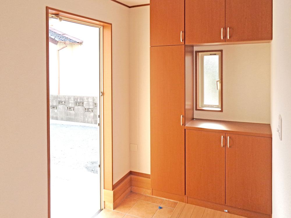 Entrance. With plenty of storage space, Entrance image is a photo.