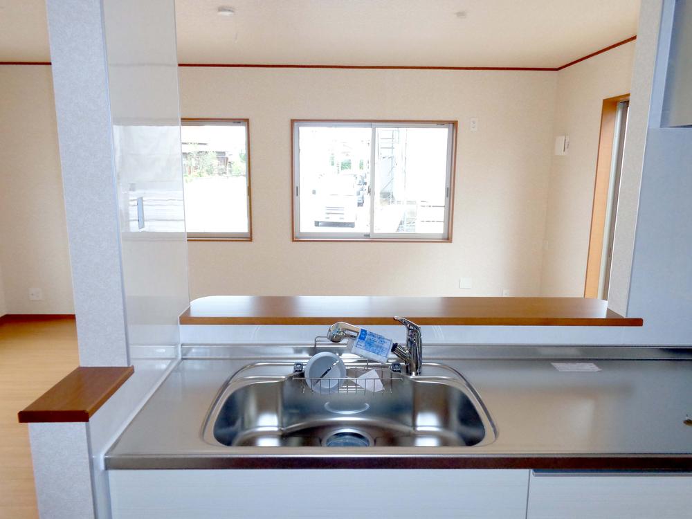 Kitchen. Living overlooks while the housework.