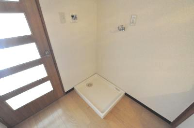 Other Equipment. Washing machine in the room