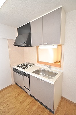 Kitchen. 3-neck gas stove of the system kitchen with grill