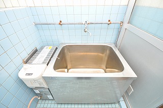 Bath. Instantaneous water heater in the balance kettle