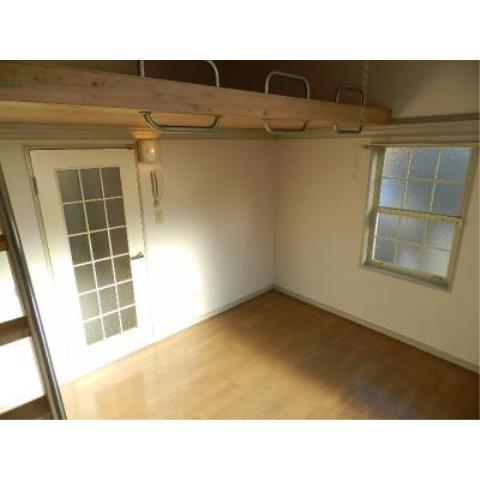 Living and room. There is a south-facing bay window!