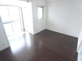 Living and room. Dark color of the floor is fashionable