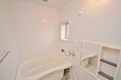 Bath. Bathtub side during the cleaning