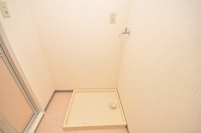 Other Equipment. Washing machine in the room