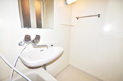 Washroom. Wash basin attached to the bathroom