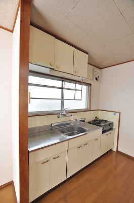 Kitchen. It is a big kitchen to the left and right of space