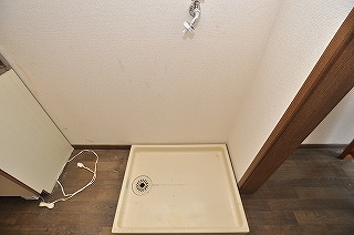 Other Equipment. Washing machine in the room