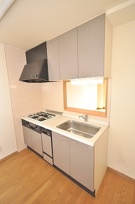 Kitchen. 3-neck gas stove of the system kitchen with grill