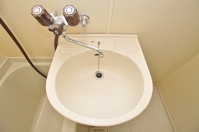 Washroom. It comes with a wash basin with bathroom.