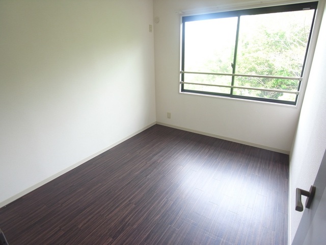 Living and room. Flooring of dark wood is fashionable