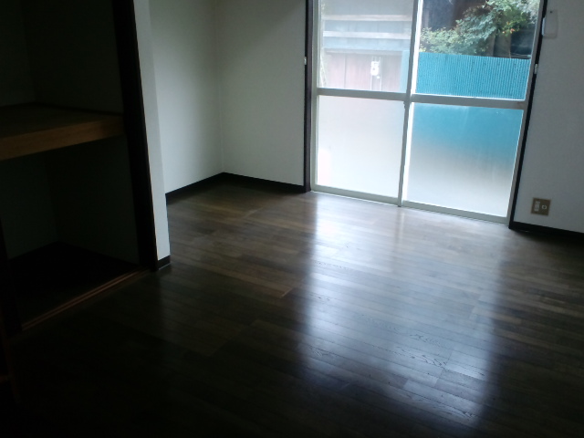 Living and room. Opening from the living room is (window side).