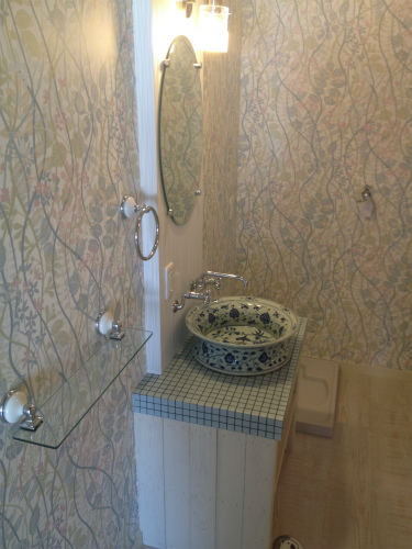 Washroom. I get dressed in the morning in a cute wash basin