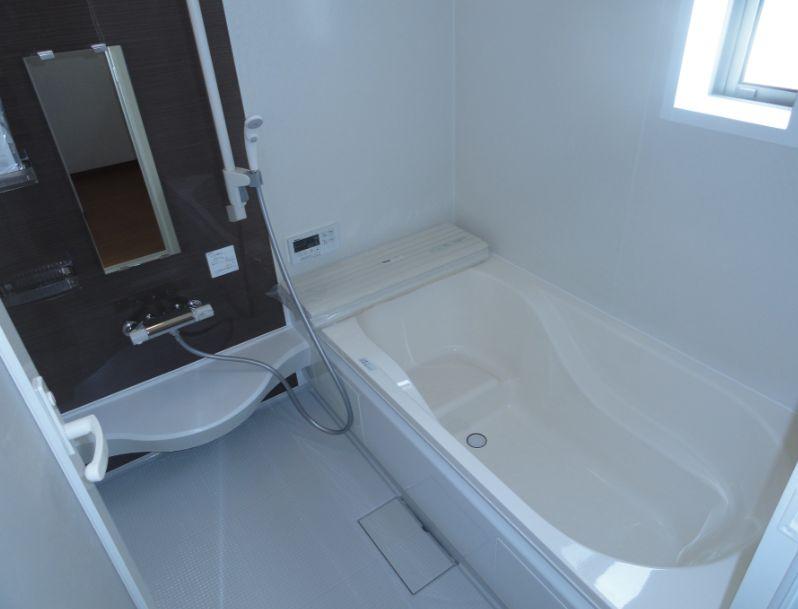 Bathroom. The photograph is the same type