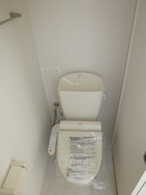 Toilet. Washlet is with