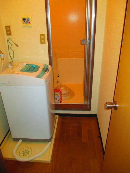 Washroom. With new washing machine! 