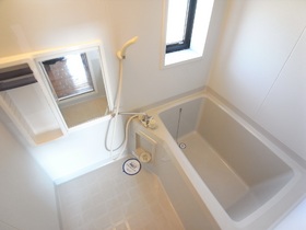 Bath. Bright bathroom with a window