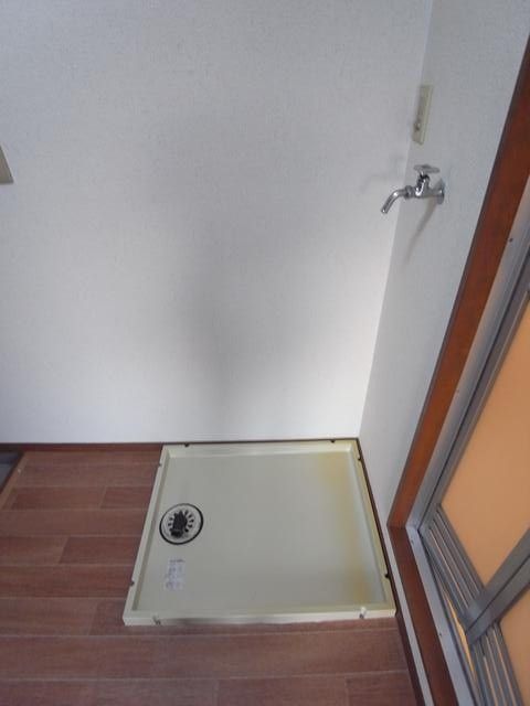 Other Equipment. Women happy Washing machine in the room also