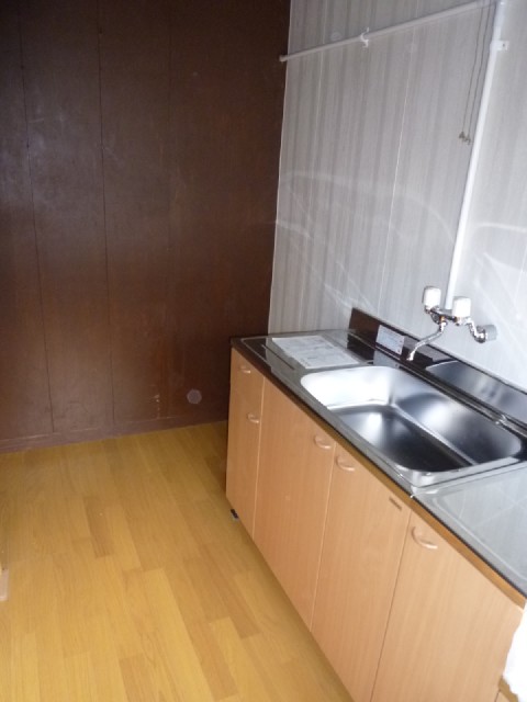 Living and room. There is also a refrigerator space