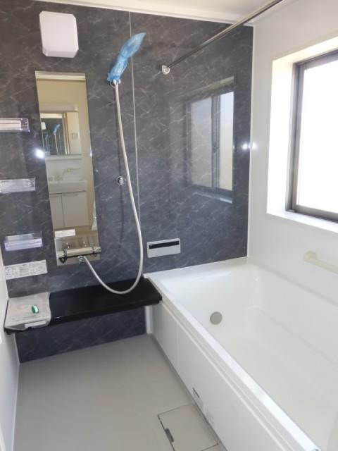 Bathroom. The bathrooms are equipped with large windows