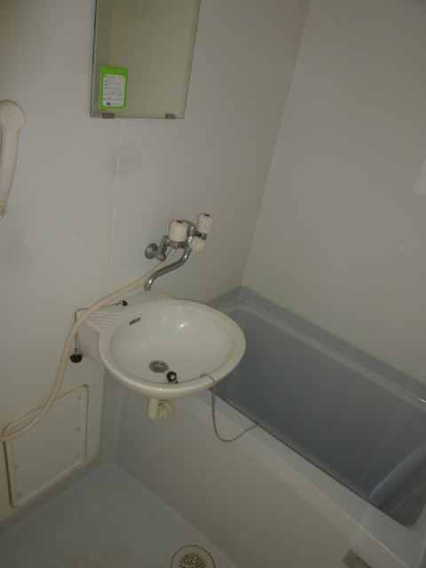 Bath. Wash basin is together.