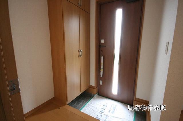 Entrance. With shoes stocker