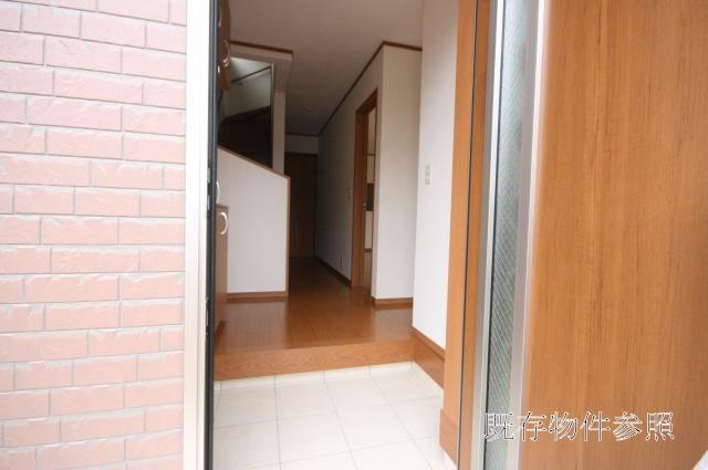 Entrance. With shoes stocker