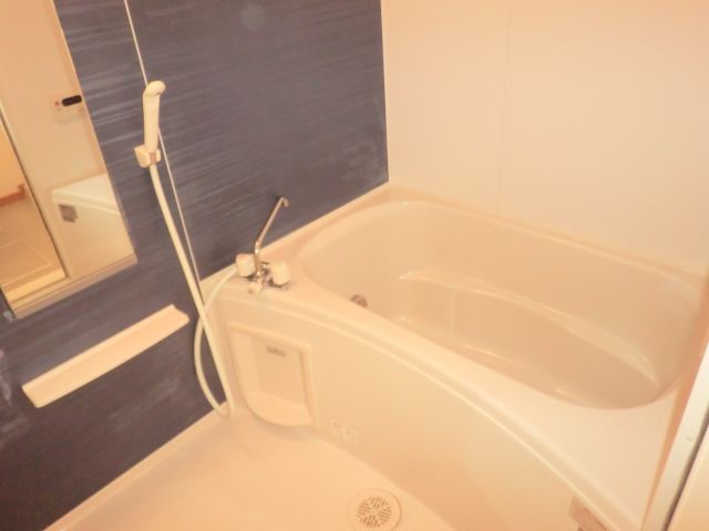 Bath. It is a stylish bathroom if there is an accent