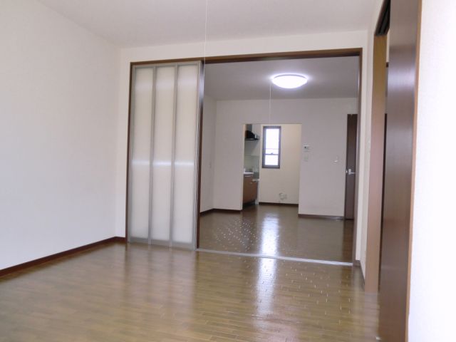 Living and room. Will be open space if Akere the door