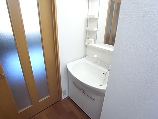 Washroom. With happy shampoo dresser in a busy morning