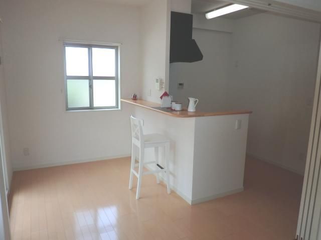 Living and room. In the living there is also a bay window.