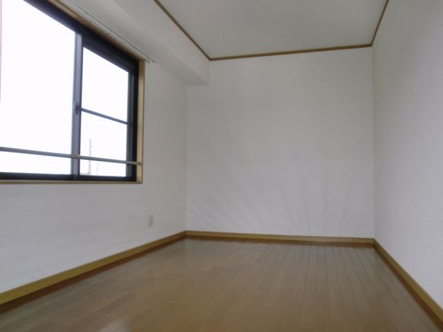 Living and room. Bright with large windows in the north side of the room. 