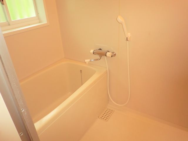 Bath. It is a good small window There is also a ventilation.