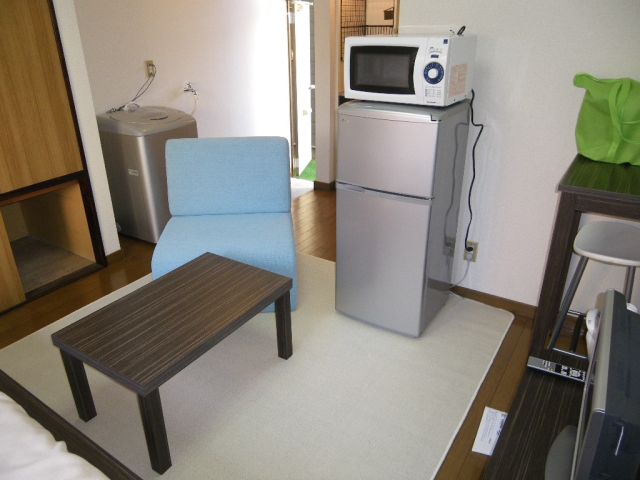 Living and room. Furniture appliances commitment equipped.